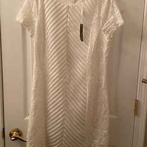 White lace dress. New never used.